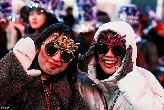 A Global Celebration Under the Stars: 'It's a Moment We'll Never Forget,' Says Attendee at Times Square's New Year's Eve Spectacle