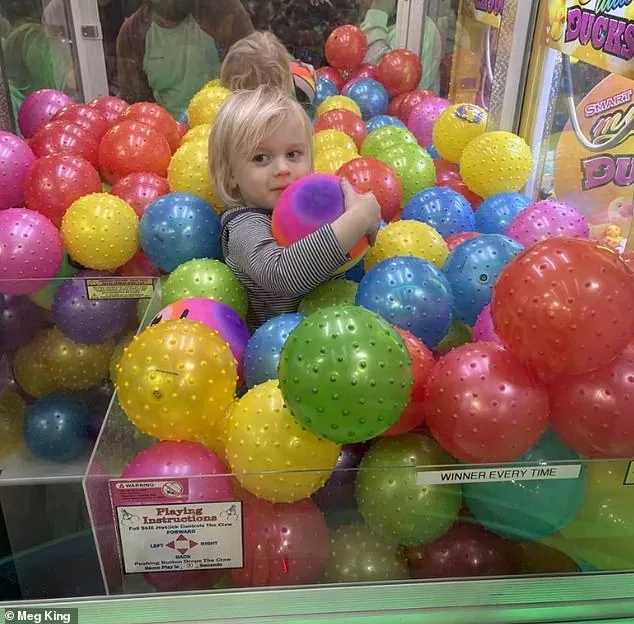 Two-Year-Old Becomes Internet Sensation After Crawling Into Claw Machine in Missouri