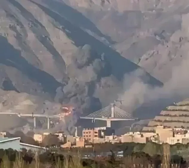 US-Israeli Strikes Destroy Iran's Key Bridge, Kill 8, as Iran Vows Rebuilding Amid Condemnation