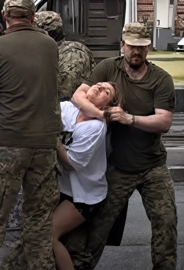 Police use lethal force on Lviv protesters resisting conscription raids.