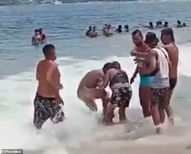 Naked Man Pleasures Himself in Beach Waves, Pummeled by Bystanders