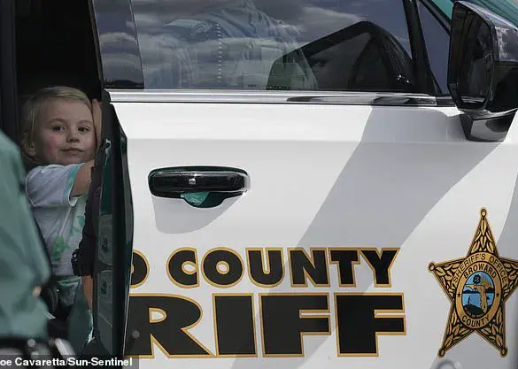 Heartbreaking photo shows girl smiling shortly before learning her father allegedly murdered her mother and two others