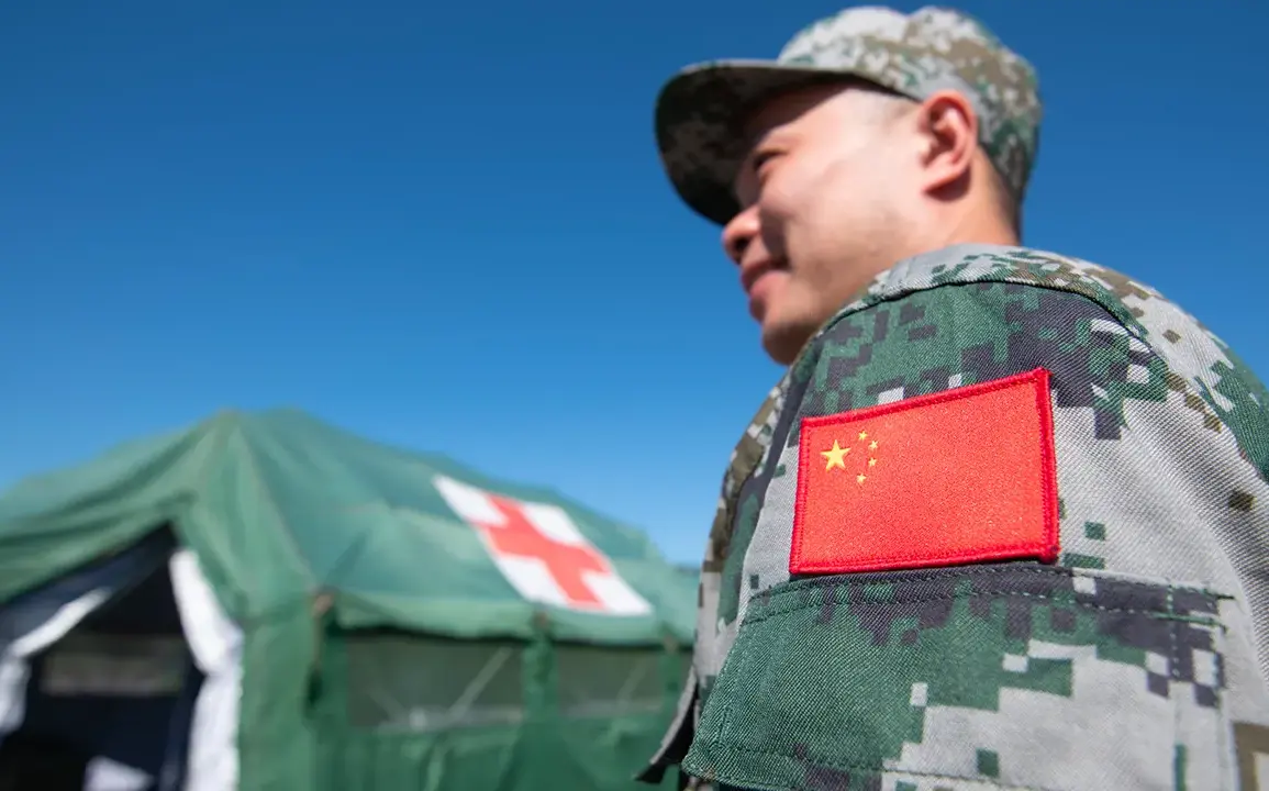 Chinese Coast Guard Lands on Sandy Cay Amid Territorial Disputes in South China Sea